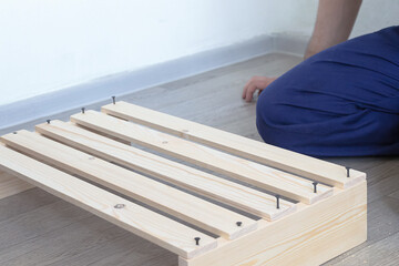 Furniture manufacturing. Joinery. Wooden slats. Hand carpentry.