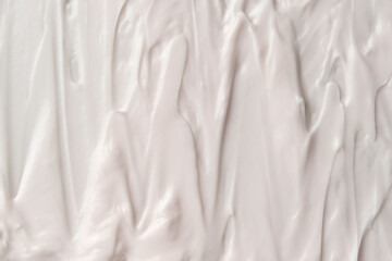 Layered creamy strokes create a textured abstract surface ideal for beauty or skincare branding.