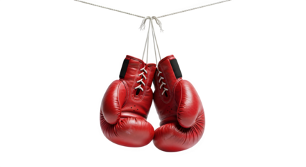 Red boxing gloves hanging on a rope for combat sport