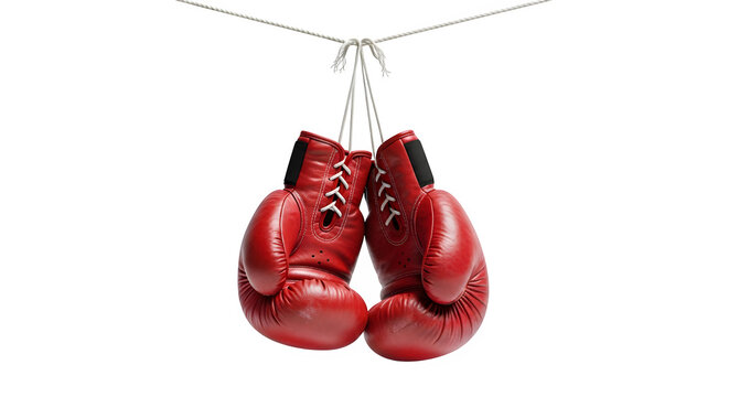Red boxing gloves hanging on a rope for combat sport