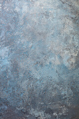 Abstract blue-gray wall texture resembling natural stone. Copy space. Top view.