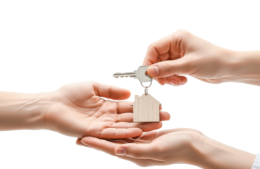 Handing over house keys with a wooden houseshaped keychain, symbolizing home ownership and real estate transaction