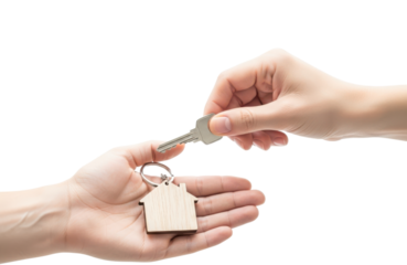 Handing over a house key with a houseshaped keychain, symbolizing home ownership and real estate transaction