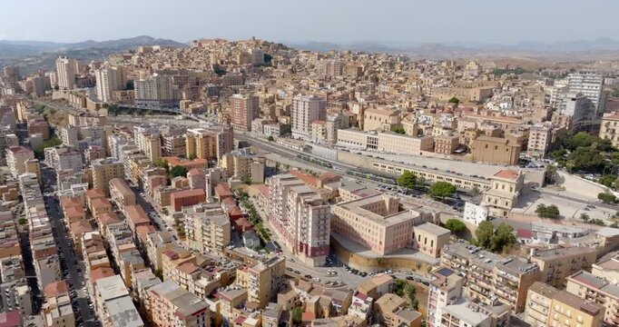 Aerial view of the historic center of Agrigento city, in Sicily, Italy. This Sicilian capital, located on a hilltop, was known in ancient times as Akragas. It's a beautiful, sunny summer day.