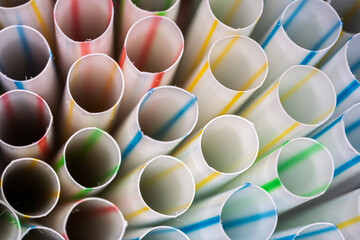 Macro view of colorful striped drinking straws in close-up