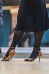 Dancers in a vibrant dance class in high-heeled shoes