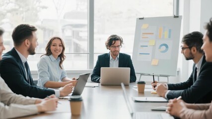 Diverse business team collaborating during a meeting in a bright, modern office. Professionals discussing charts and ideas, fostering teamwork and creativity for company growth. - Powered by Adobe