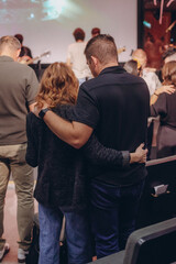 Fototapeta premium A Group of Christians pray to bless and pray for each other in church