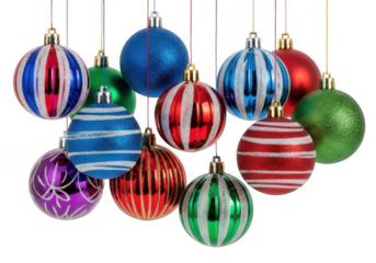A collection of colorful christmas ornaments hanging against a pure transparent background, isolated on transparent background