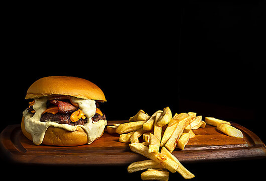 https://esp.gettyimages.com/contribute/batches/57970695#:~:text=Homemade%20burger%20with%20potatoes%2C%20bacon%2C%20cheddar%20cheese%20and%20special%20mayonnaise%20sauce.