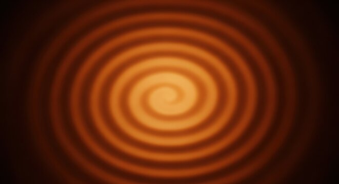Abstract blurred warm toned spiral background with swirling dark brown and orange concentric gradient circles