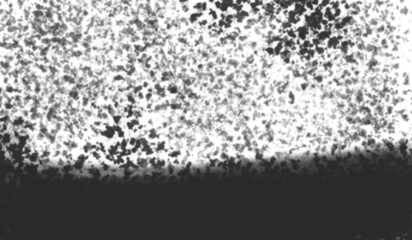 Abstract textured spray paint splatter effect with dark bottom