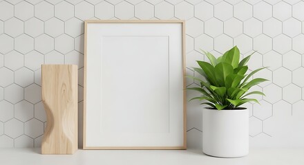 Elegant framed art on white shelf with plant and wood decor item