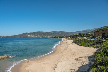 Spectacular view Golf at Sagone Corsica France beautyful sand Beach boats mountain village Tourism and vacations concept