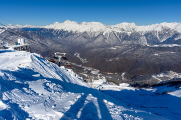 Winter landscape with mountain peaks covered with snow.