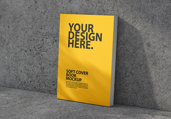 Portrait Soft cover book mockup with shadows from plant