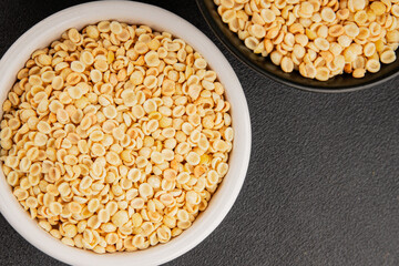 Orecchiette small pasta drum wheat pasta Italian food tasty snack fresh delicious gourmet food table setting rustic top view copy space