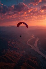 Paragliding Over Stunning Mountains at Sunset in a Breathtaking Landscape