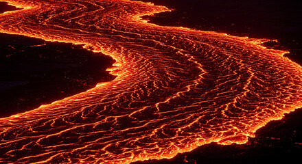 Aerial view of a river of molten lava flowing across a dark landscape in a volcanic eruption ai generated