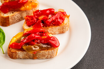 Bruschetta roasted pepper vegetable dish natural product tasty snack fresh delicious gourmet food background on the table rustic top view copy space vegan and vegan food