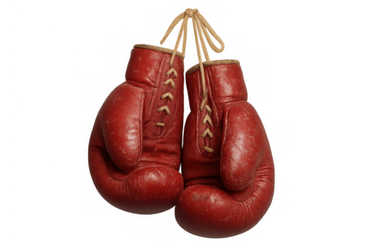 Vintage red boxing gloves hanging, showing sport passion, retirement, and the end of a fighting career