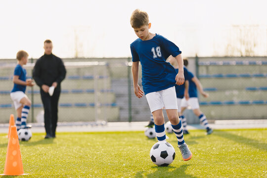 Teen Boy Controlling Soccer Ball – Youth Football Practice and Ball Mastery Training on Grass Field