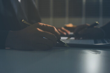 Lawyer explained to the client about the law that must be brought against the court case.