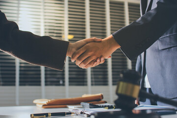 Lawyer explained to the client about the law that must be brought against the court case.