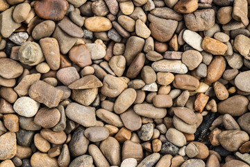 Texture of pebbles as background, top view