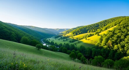 Lush Green Rolling Hills Valley with River and Blue Sky.