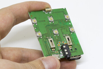 Perspective view of a compact Bluetooth audio player board featuring USB-C, USB-A host, 3.5 mm AUX jack and rear control buttons, isolated on white
