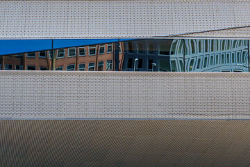 Modern urban building with reflection in windows 