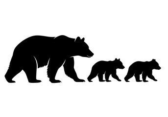 A silhouette of a bear mother and her two cubs walking