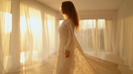 Radiant young woman gracefully moving in a ethereal lace dress, bathed in golden light, perfect for fashion, beauty, and lifestyle brands seeking a touch of elegance and modern charm