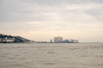 Industrial port facilities along the Tagus River in Lisbon Portugal