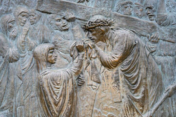 Station VI: Veronica wipes the face of Jesus. The Way of the Cross on Mount Križevac (the Cross Mountain) in Medjugorje.