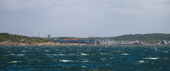 Coastal town and marina seen from the sea.