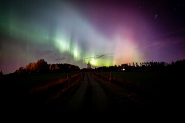 Scenic view of aurora borealis against sky at night