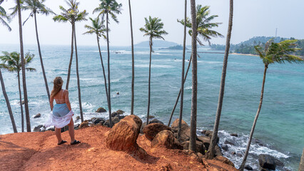 Tourist Enjoying Cocommut Tree Hill in Mirissa, Sri Lanka
