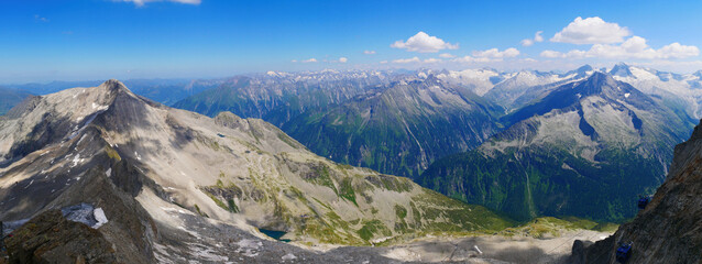 View on jagged mountains and glaciers of Zillertal alps on a summer day