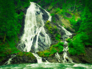 Waterfall Schleierwasserfall in the Osttirol region on a summer rainy day