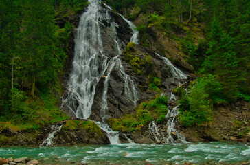 Waterfall Schleierwasserfall in the Osttirol region on a summer rainy day