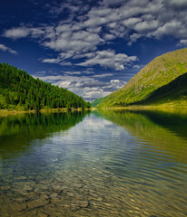 View on Obersee lake and mountains above Defereggental valley on a summer day