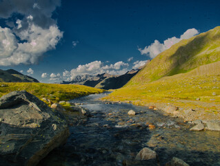 View from a Weissee lake to the Kaunertal valley on a summer evening