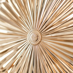 Metallic ornament with radial sunburst pattern and champagne finish