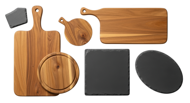 Assortment of wooden and slate cutting boards and serving platters isolated on a transparent background