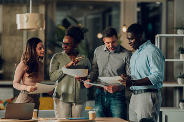 Diverse business team collaborating during office meeting