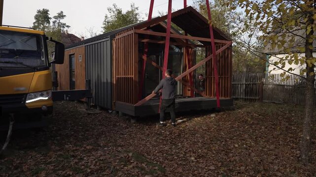 All parts of the modular house are connected and assembled.