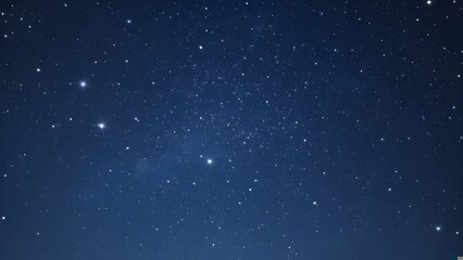 Deep blue night sky with countless twinkling stars, a serene celestial background for cosmic and astronomy themes.