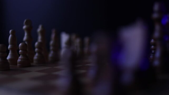 Rotating chessboard with strategically placed pieces in motion, depicting the eternal struggle between black and white factions in cerebral gameplay. Semi-darkness and blue backlight